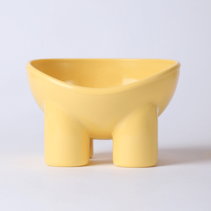 Wallas bol surrélevé jaune au design unique, idéal pour repas d'animaux, facile à nettoyer.